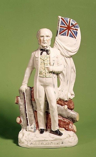 Staffordshire figure of Gladstone, 1873 by English School